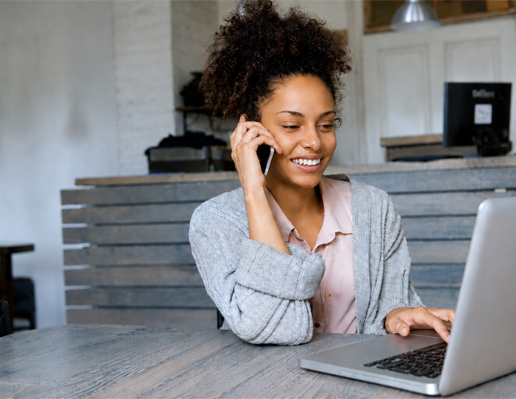 LanguageArts interpreter taking a call with a headset